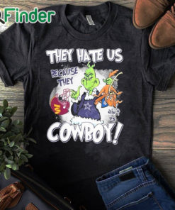 black T shirt They Hate Us Because They Ain't Us Cowboys Grinch Shirt